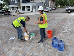 A 16-inch sub-base of larger aggregates functioned as a reservoir and an elevated underdrain allows water to infiltrate the ground. A 16-inch sub-base of larger aggregates functioned as a reservoir and an elevated underdrain allows water to infiltrate the ground.