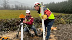 USACE flood team members Jeff Wood and Stephen Green work at a levee near Hamilton, Washington, December 5, 2023.