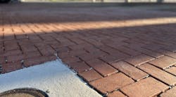 Gaps between the pavers, filled with chip stone, allow stormwater to flow freely underneath the pavers. Gaps between the pavers, filled with chip stone, allow stormwater to flow freely underneath the pavers.