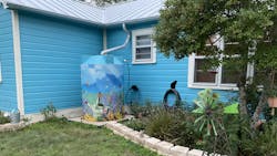 500-gallon wrapped cistern collecting from a 200 square-foot rooftop. Fills with each 2-inches of accumulated rainfall. 500-gallon wrapped cistern collecting from a 200 square-foot rooftop. Fills with each 2-inches of accumulated rainfall.