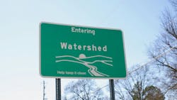 Watershed Entrance. A watershed is an area of land that drains all the streams and rainfall to a common outlet such as the outflow of a reservoir, mouth of a bay, or any point along a stream channel. The word watershed is sometimes used interchangeably with drainage basin or catchment. Watershed Entrance. A watershed is an area of land that drains all the streams and rainfall to a common outlet such as the outflow of a reservoir, mouth of a bay, or any point along a stream channel. The word watershed is sometimes used interchangeably with drainage basin or catchment.