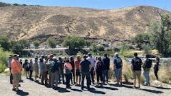 A group gathers around Danielle Henderson as she talks about Truckee River. A group gathers around Danielle Henderson as she talks about Truckee River.