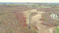 Figure 1: The Broad Meadow Brook Wildlife Sanctuary with its isolated eastern floodplain (right), looking north towards its urbanized watershed (top). Courtesy of City of Worcester. Figure 1: The Broad Meadow Brook Wildlife Sanctuary with its isolated eastern floodplain (right), looking north towards its urbanized watershed (top). Courtesy of City of Worcester.