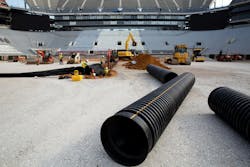 The system used 30-inch diameter mains and 2-inch diameter trunks along with a custom fabricated cross tee. The system used 30-inch diameter mains and 2-inch diameter trunks along with a custom fabricated cross tee.