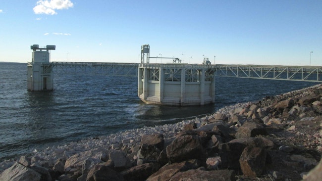 Primary Spillway and hydroelectric structures at Kingsley Dam - the second largest hydraulic fill dam in the world. The structure on the left manages the intake gates for the hydroelectric plant.