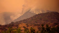 California Wildfire. Los Angeles Fire Near the City. Fires in the United States. Smoke and fire in the mountains of California. Plumes of smoke California Wildfire. Los Angeles Fire Near the City. Fires in the United States. Smoke and fire in the mountains of California. Plumes of smoke