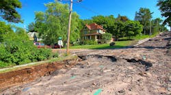 Houghton Michigan Flash Flood Damage. Houghton, Michigan, USA - June 18, 2018: Intense storm rainfall and flash flooding in June of 2018 caused property damage and completely washed out Agate Street in the town of Houghton, Michigan. Houghton Michigan Flash Flood Damage. Houghton, Michigan, USA - June 18, 2018: Intense storm rainfall and flash flooding in June of 2018 caused property damage and completely washed out Agate Street in the town of Houghton, Michigan.