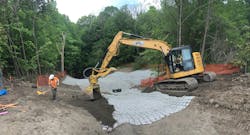 Anchor trenches at edges of Flexamat rolls. Anchor trenches at edges of Flexamat rolls.