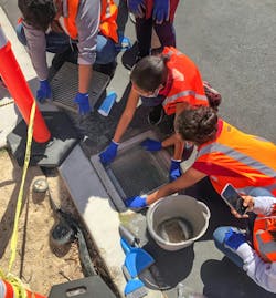 At Carver Elementary School in Santa Ana, California, fifth-grade students roll up their sleeves to clean a campus catch basin as part of Poseidon Education’s Stormwater Quality Leadership Program. (Credit: Poseidon Education) At Carver Elementary School in Santa Ana, California, fifth-grade students roll up their sleeves to clean a campus catch basin as part of Poseidon Education’s Stormwater Quality Leadership Program. (Credit: Poseidon Education)