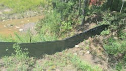 Functional silt fence. Functional silt fence.