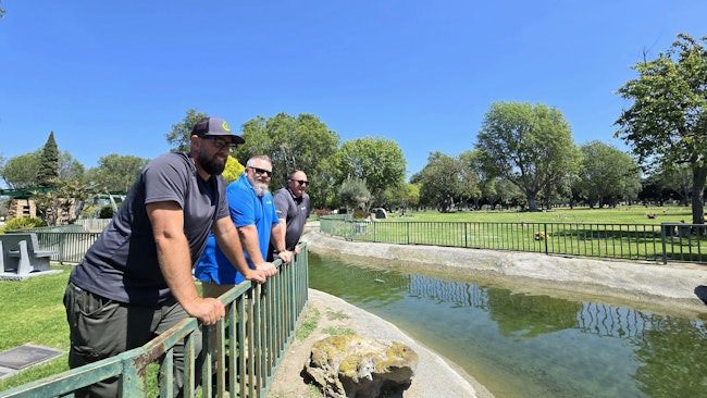 Dan Mudd (Mudd Landscapes), Andrew Chase (Davey Institute Project Manager), and Brian Borkowicz (Davey Institute Biochar Expert) at Westminster Memorial Park&rsquo;s restored irrigation pond.