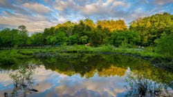 Lake Needwood at sunset, at Upper Rock Creek Park in Derwood, Maryland Lake Needwood at sunset, at Upper Rock Creek Park in Derwood, Maryland