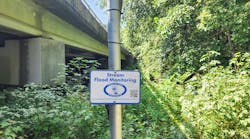Stormwater management sign under bridge in North Carolina town Stormwater management sign under bridge in North Carolina town