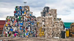 Piles of colorful plastic waste on a recycling site Piles of colorful plastic waste on a recycling site