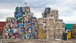 Piles of colorful plastic waste on a recycling site Piles of colorful plastic waste on a recycling site