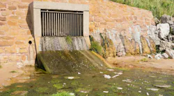 Storm drain outflow onto a beach Storm drain outflow onto a beach