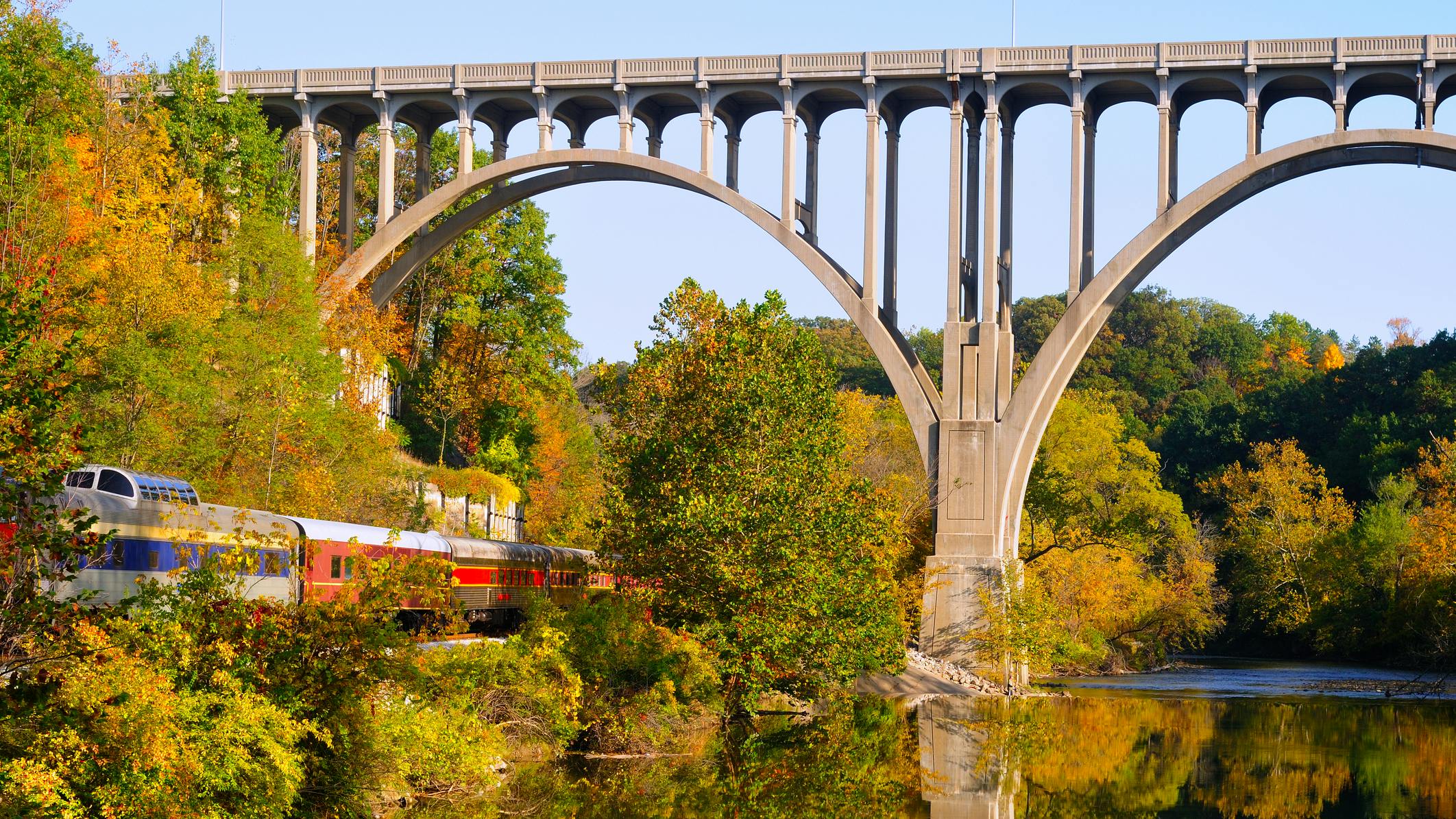 Arched bridge and passenger train