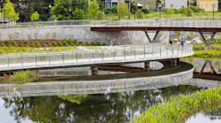 Throughout the years, dramatic increases in impervious surfaces had contributed to flooded streets and homes in the Historic Vine City community in Atlanta, Georgia. A watershed achievement in many ways, the 16-acre Rodney Cook Sr. Park captures and stores up to 10 million gallons of stormwater.