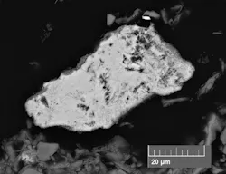 SEM-EDS backscatter images of fine-grained iron-oxides coating a sand-sized mineral grain. SEM-EDS backscatter images of fine-grained iron-oxides coating a sand-sized mineral grain.