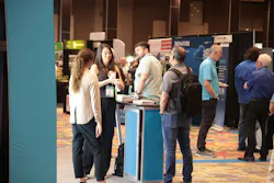 Attendees network at StormCon 2024.