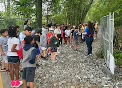 The project incorporated robust community engagement and educational programming. Initiatives included environmental leadership programs like this walking field trip with the neighborhood elementary school.
