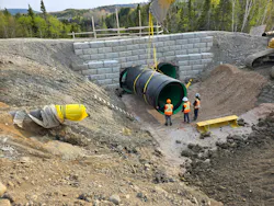 The new culvert was constructed of two parallel runs of 1500 mm (60 inch) diameter high-density polyethylene pipe.